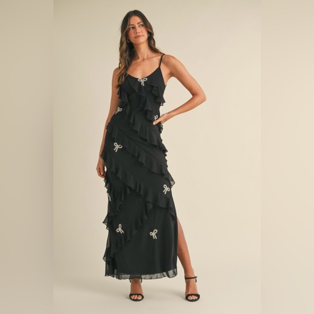 Ruffle tiered dress with rhinestone bows.
